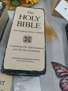 Unique artwork crafted in the shape of the Holy Bible Фото