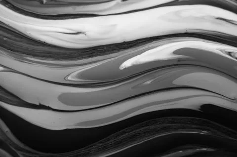 Unique background of different shades of gray. Unique abstract wavy background. Stock Photos