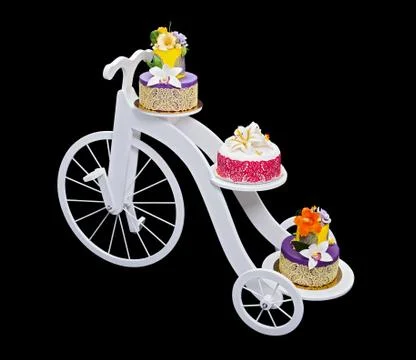 Unique bicycle cake stand with three cakes Stock-Fotos