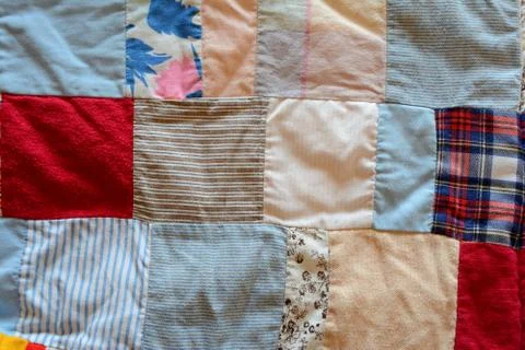Unique blanket made of various pattern fabrics - background Stock Photos