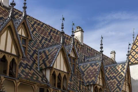 Unique brightly coloured and patterned tiled rooves Stock Photos