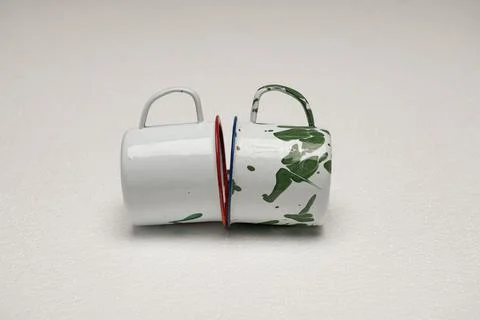 Unique ceramic cups with artistic designs Stock Photos