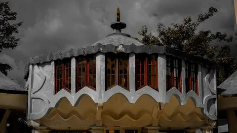 Unique Circular Architectural Structure with Red Windows Stock Photos