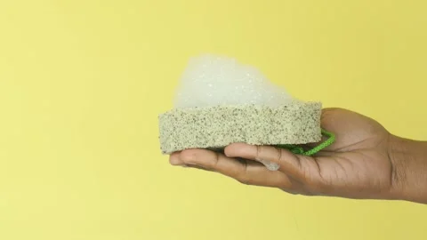Unique cleansing tool demonstration in bright setting Vídeo Stock 305015199