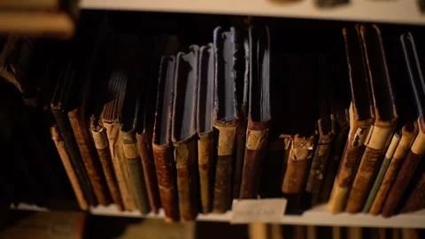A unique collection of old books which are many centuries old Stock Footage 120779029