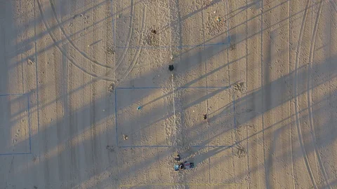 Unique drone perspective of beach volleyball Stock Footage 96906207