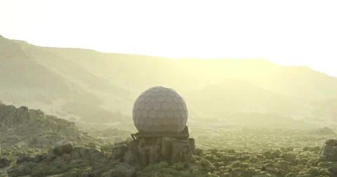 Unique geodesic dome on rocky landscape at sunrise in desert 库存影片 304508450