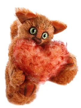 Unique ginger Cat holding fluffy heart in his paws on white back Stock Photos