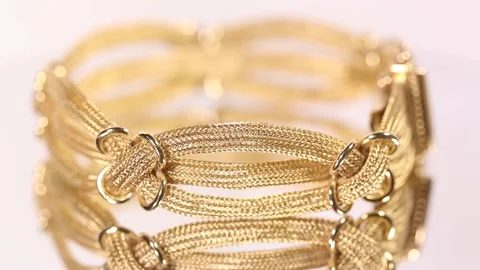 Unique gold bracelet Stock Footage 149937027