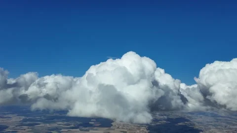 Unique immersive  pilot POV in a real time flight in a splendid blue sky Stock Footage 280380096