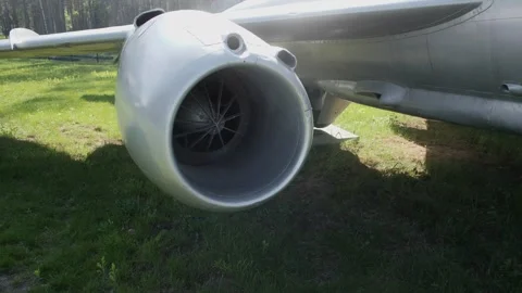 Unique Look at a Fighter Jet Engine in a Green Park Setting, Showcasing Stock Footage 310034807