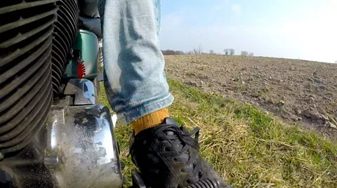 Unique low angle point of view of motorbike while riding on country road. Stock Footage 63486098