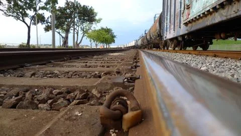 Unique Low Perspective of Train Tracks and Train Stock Photos