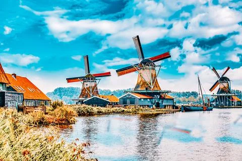 Unique old, authentic, real working windmills in the suburbs of Amsterdam. Stock Photos