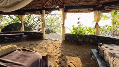 Unique Open-Air Beach Accommodation Surrounded by Nature at Sunrise Stock Footage 342800972