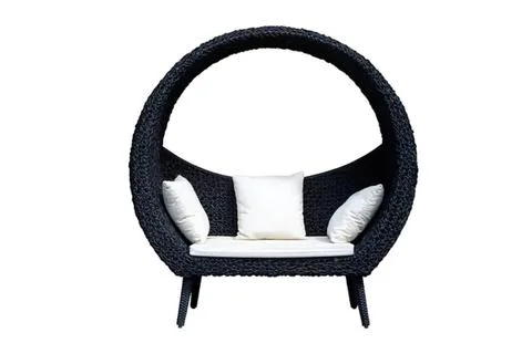 Unique outdoor sofa with circular design and white cushions Stock Photos