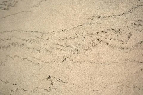 Unique patterns in soft beach sand reveal nature's artistry Stock Photos