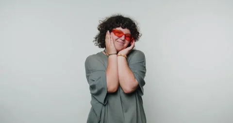 Unique performance by individual with vibrant sunglasses showcasing diverse.. Stock Footage 313273618