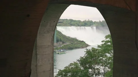 Unique perspective of Niagara Falls seen through concrete arch, capturing beauty Stockbeeldmateriaal 291985993