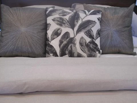 Unique pillows on a bed Foto stock