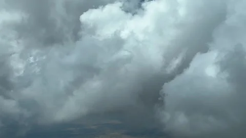 An unique pilot’s perspective: flying trough a sky full of tiny cumulus Stock Footage 246307000