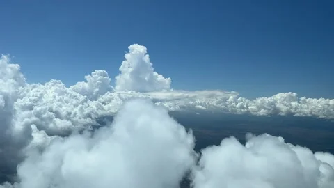 Unique pilot’s point of view of a sky with some tiny clouds, shot from a Stock Footage 243340197