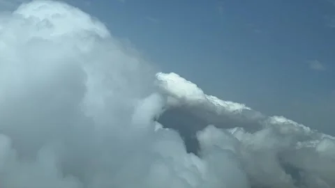 An unique pilot’s point of view while flying in a jet across a sky with Stock Footage 246307051