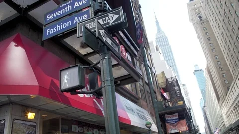 Unique POV view of Empire State Building ESB in midtown with 7th Fashion avenue Stock Footage 83550798