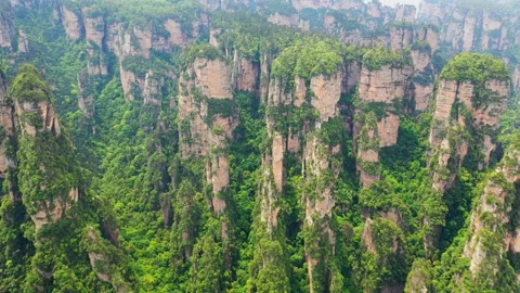 Unique quartzite pillars and peaks in zhangjiajie national forest park Stock Footage 218713070