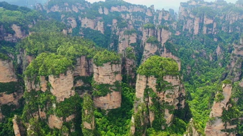 Unique quartzite pillars and peaks in zhangjiajie national forest park Stock Footage 218715655