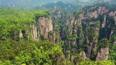 Unique quartzite pillars and peaks in zhangjiajie national forest park Stock Footage 218727735