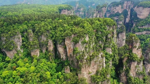 Unique quartzite pillars and peaks in zhangjiajie national forest park Stock Footage 218733419
