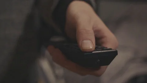 A Unique Remote Controller Pressable- Close up Shot Stock Footage 128475742
