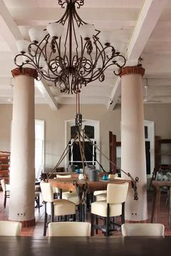Unique restaurant interior, hanging table, chandelier, Paramaribo, Suriname Stock Photos
