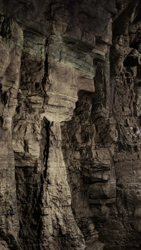 Unique rock formation resembling a face found in a cave in nature Stock Footage 331443518