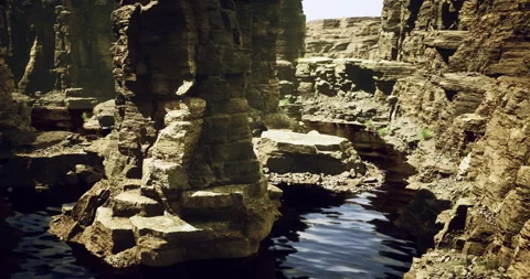 Unique rock formations and tranquil waters in a remote canyon landscape Vídeos de archivo 317777967
