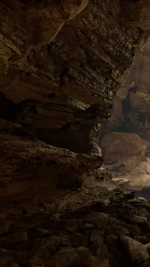 Unique rock formations in a cave with dim light and shadows Stock Footage 332228548
