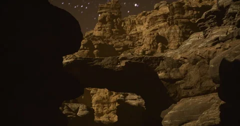Unique rock formations illuminated by night sky in remote desert location Stock Footage 306200660