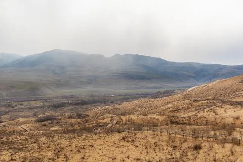 A unique sandy mountain in the Caucasus on a cloudy day. 스톡 사진