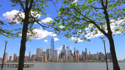 Unique shape clouds float over the Lower Manhattan skyscraper NYC. Video stock 155421403