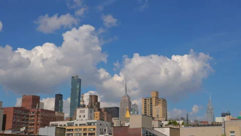 Unique shape clouds move over the East Village in New York City Stock Footage 252144801
