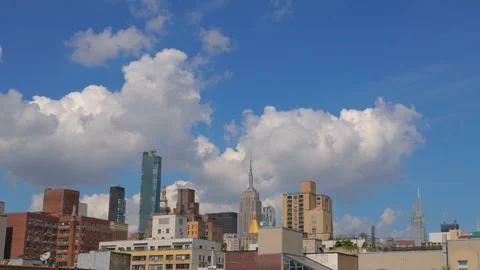 Unique shape clouds move over the East Village in New York City Stock Footage 252145175