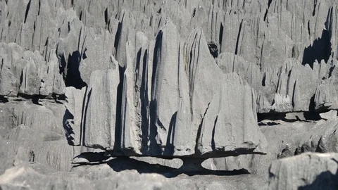 Unique Shaped Limestone Formation Perched On Top of Tsingy, Madagascar Stock Footage 117438243
