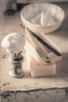 Unique shaving set. Sharp razor, soap and brush Stock Photos