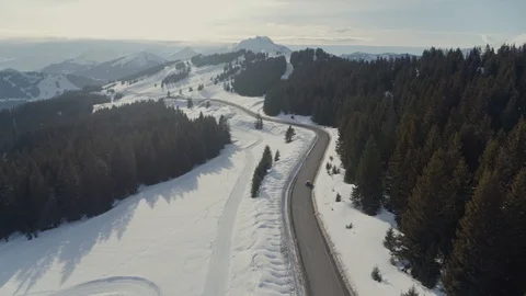 Unique shot of a car alone on a mountain road 4K Stock Footage 99931539