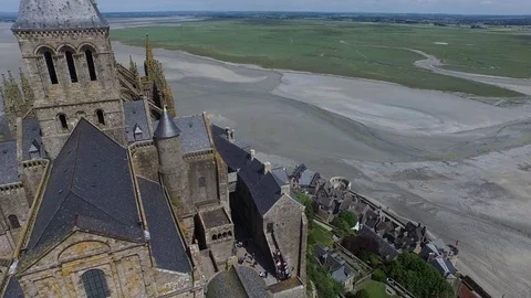 Unique shot of a close rotation around Mont Saint Michel, France 4K Stock Footage 76961491