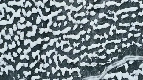 Unique snow and ice texture in dark blue and white Stock Footage 168583813