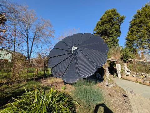 Unique solar panel shaped like giant flower with petal design Stock Photos