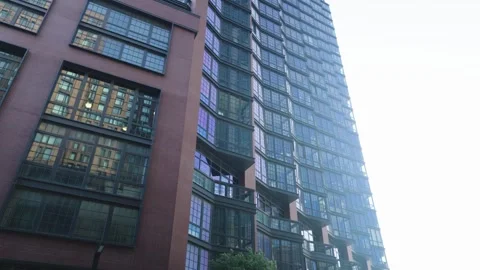 Unique stepped glass window and red brick building in Greenpoint Brooklyn Stock Footage 243811522