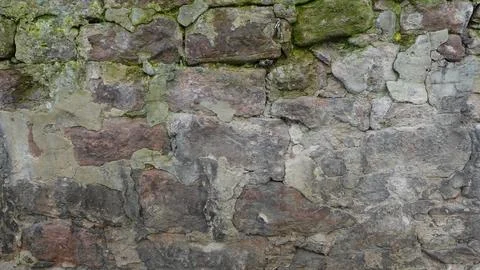 Unique Textures of an Ancient Stone Wall in a Historic Location Stock Photos